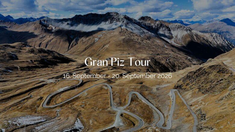 Header Bild der Gran Piz Tour: Dramatische Serpentinen in der kargen Berglandschaft des Gran Piz.